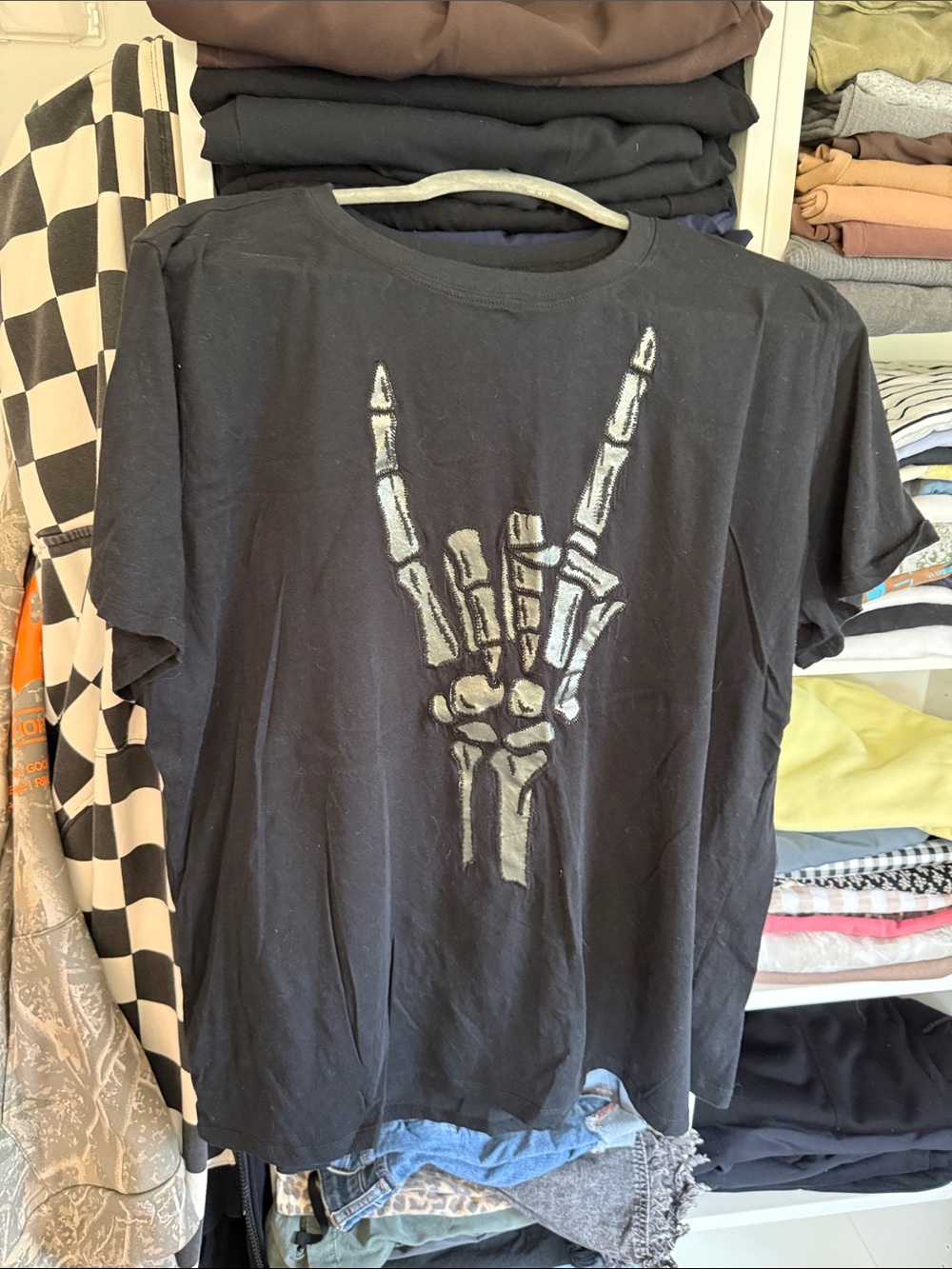 torrid Black Tee with Gunmetal Shimmer Skeleton Hand Graphic